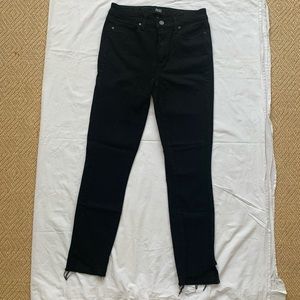 Black PAIGE skinny jeans with stretch.